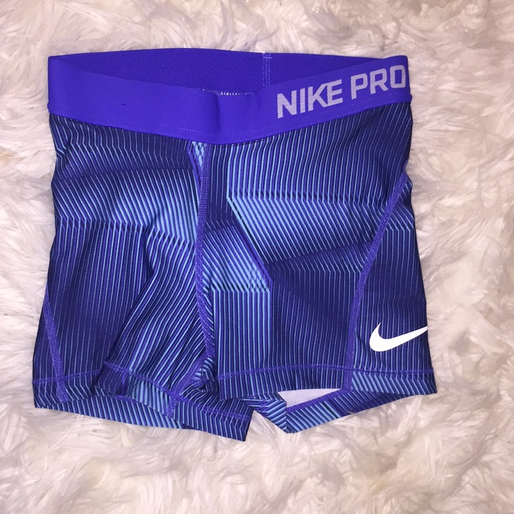 Blue patterned Nike pros